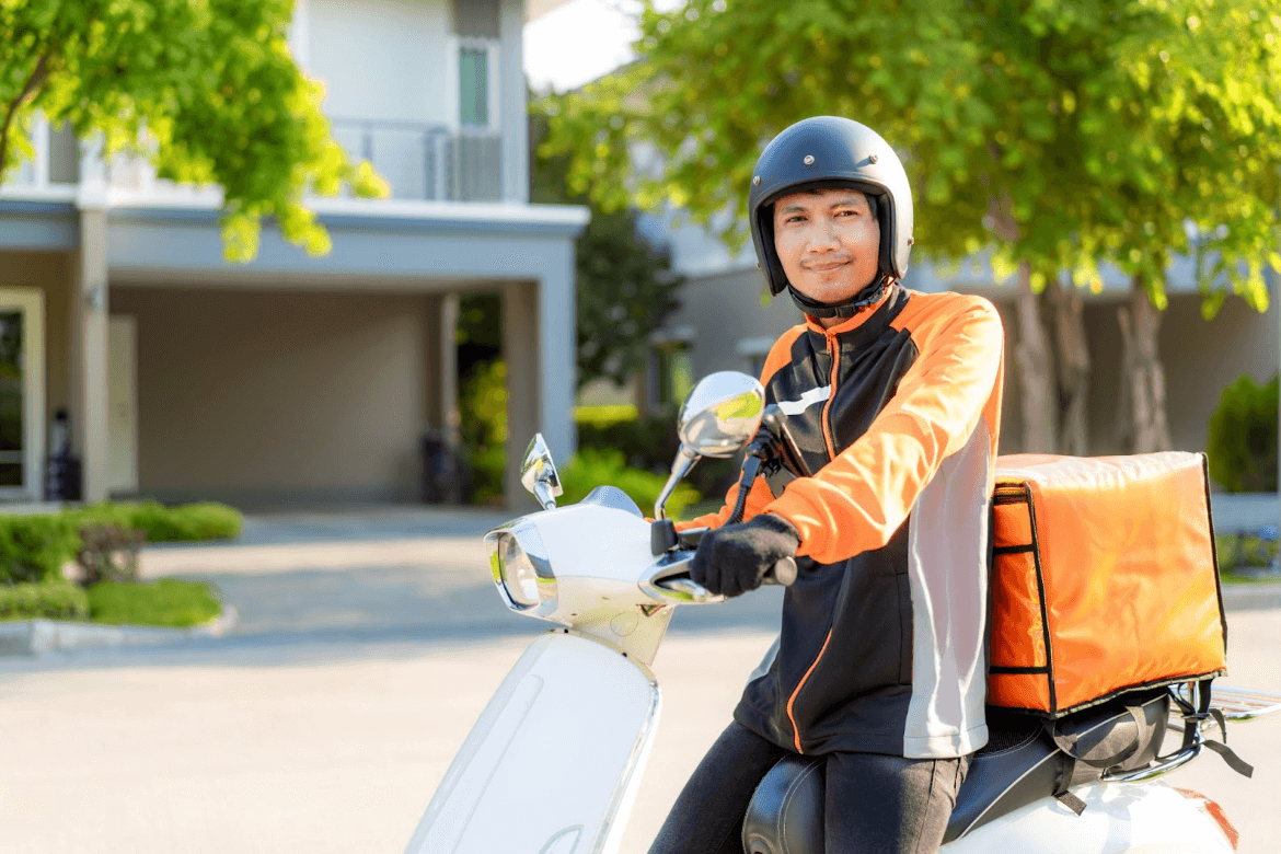 smiling delivery driver on duty